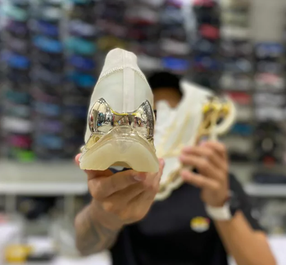 SORAYAMA GOLD SNEAKERS